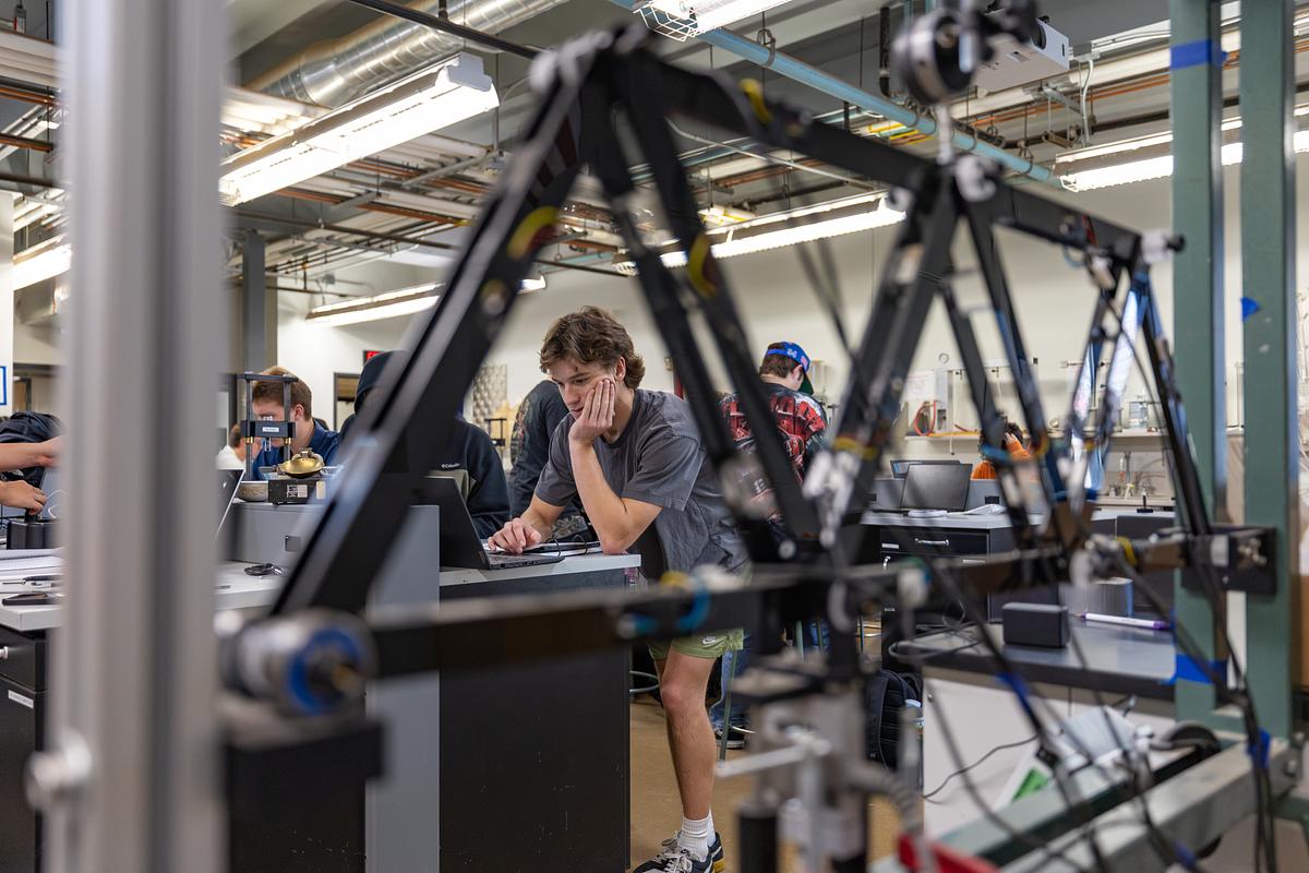 Technician in semiconductor lab environment